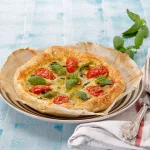 Logotipo Tarte de espinafres e alho-francês